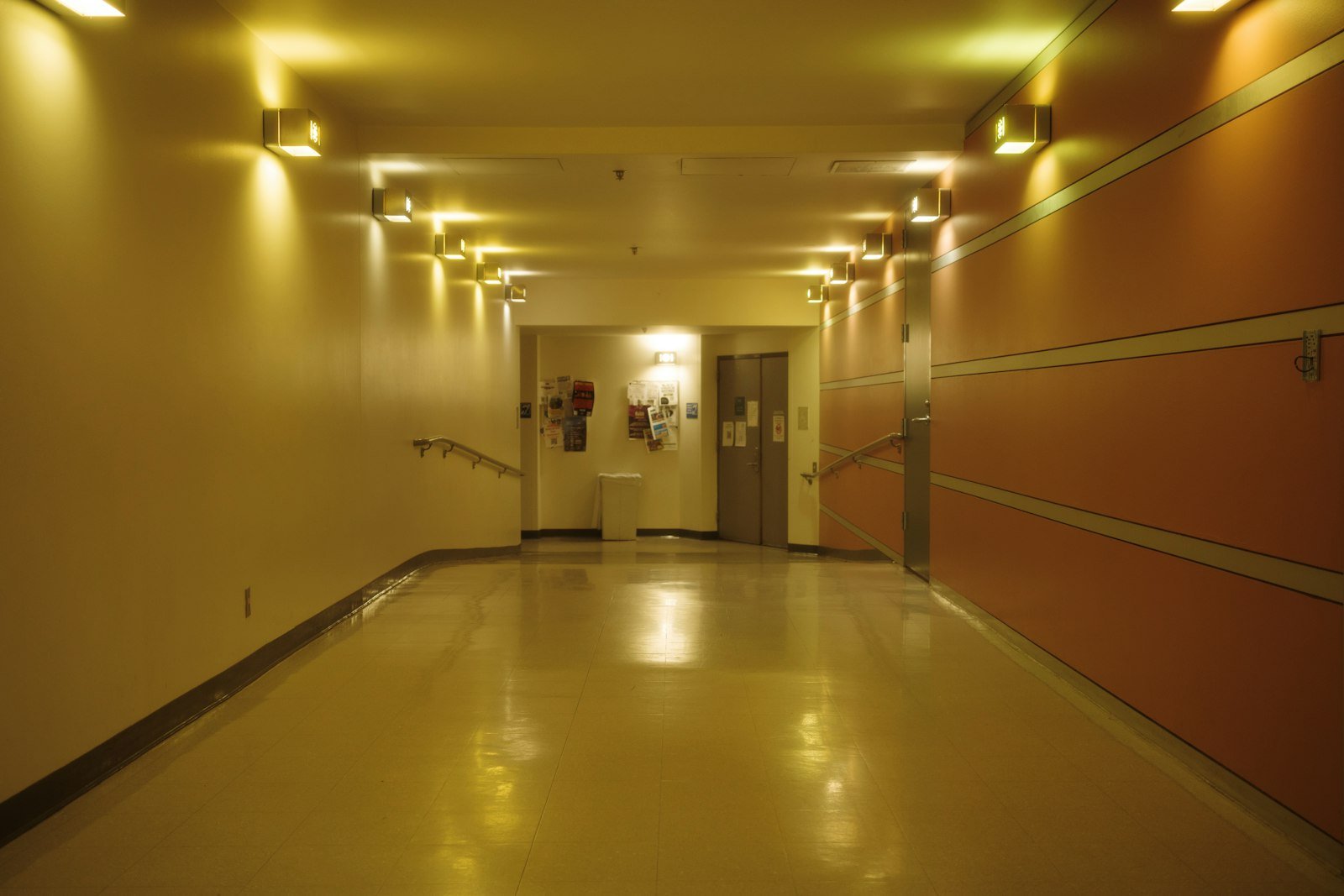 Well-lit modern corridor with ceiling lighting representing a Li-Fi technology deployment