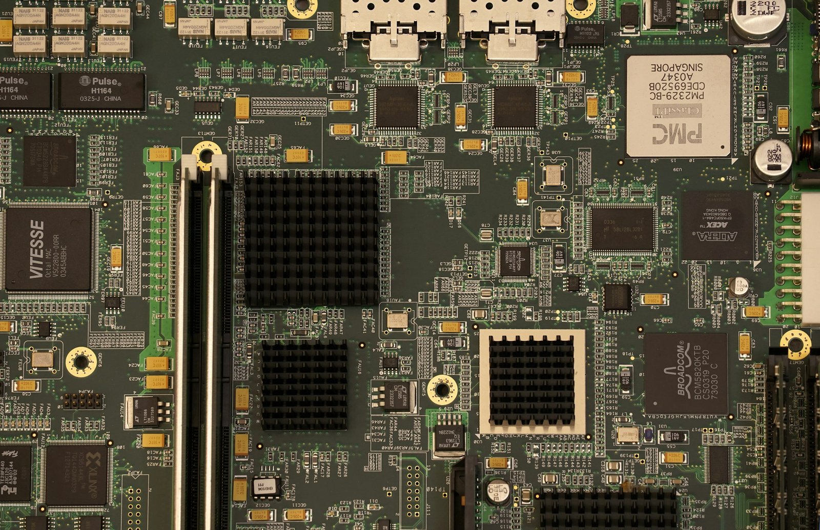 Close-up of computer circuitry representing the hardware behind AI network optimization