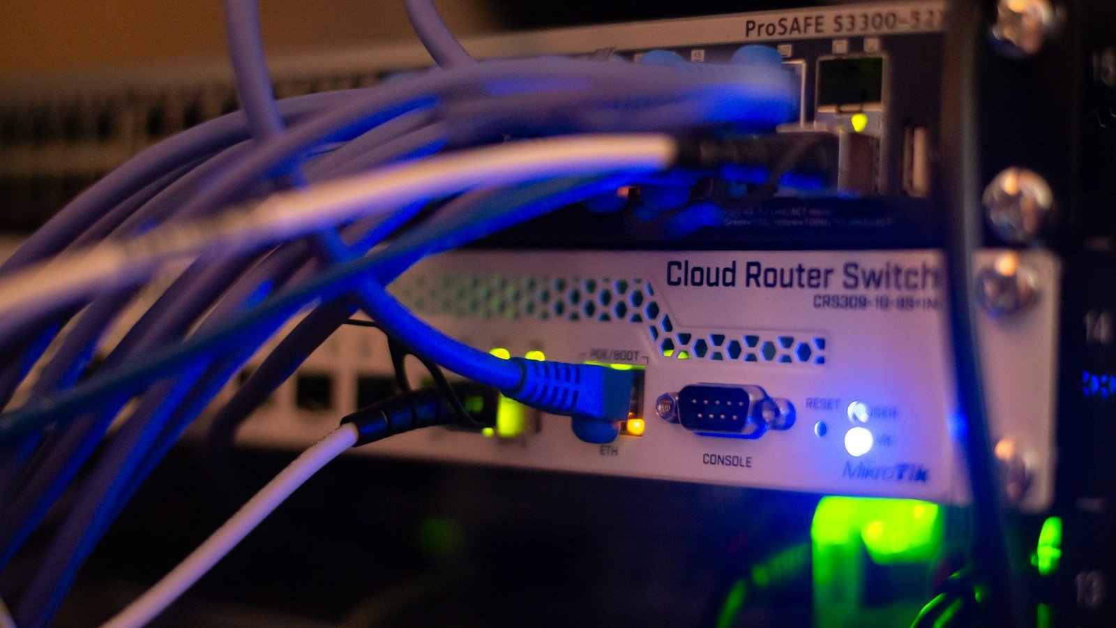 Network equipment with wires connected, where oversized buffers build queues