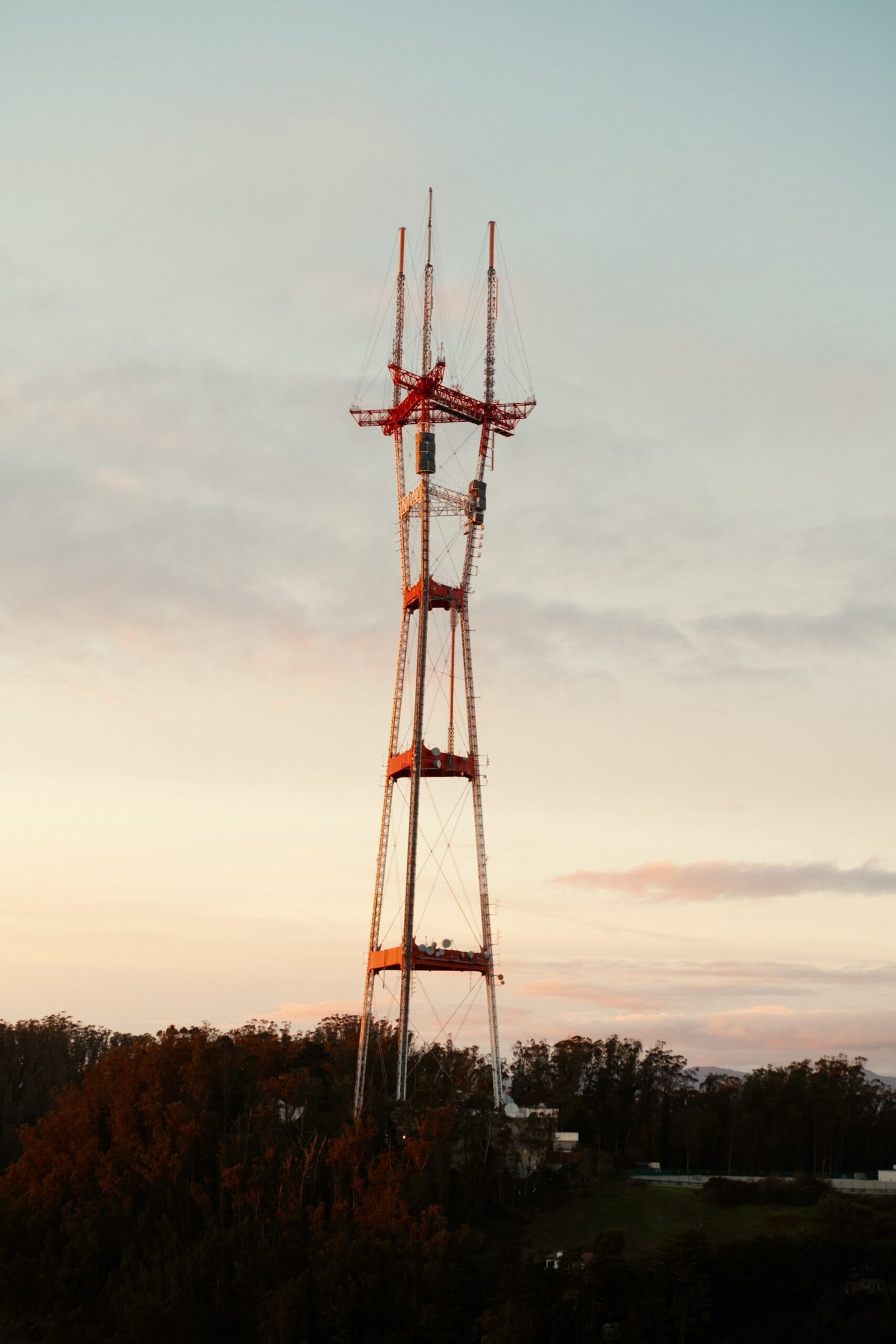 Tall radio tower at sunset, illustrating the long-range reach of Wi-Fi HaLow